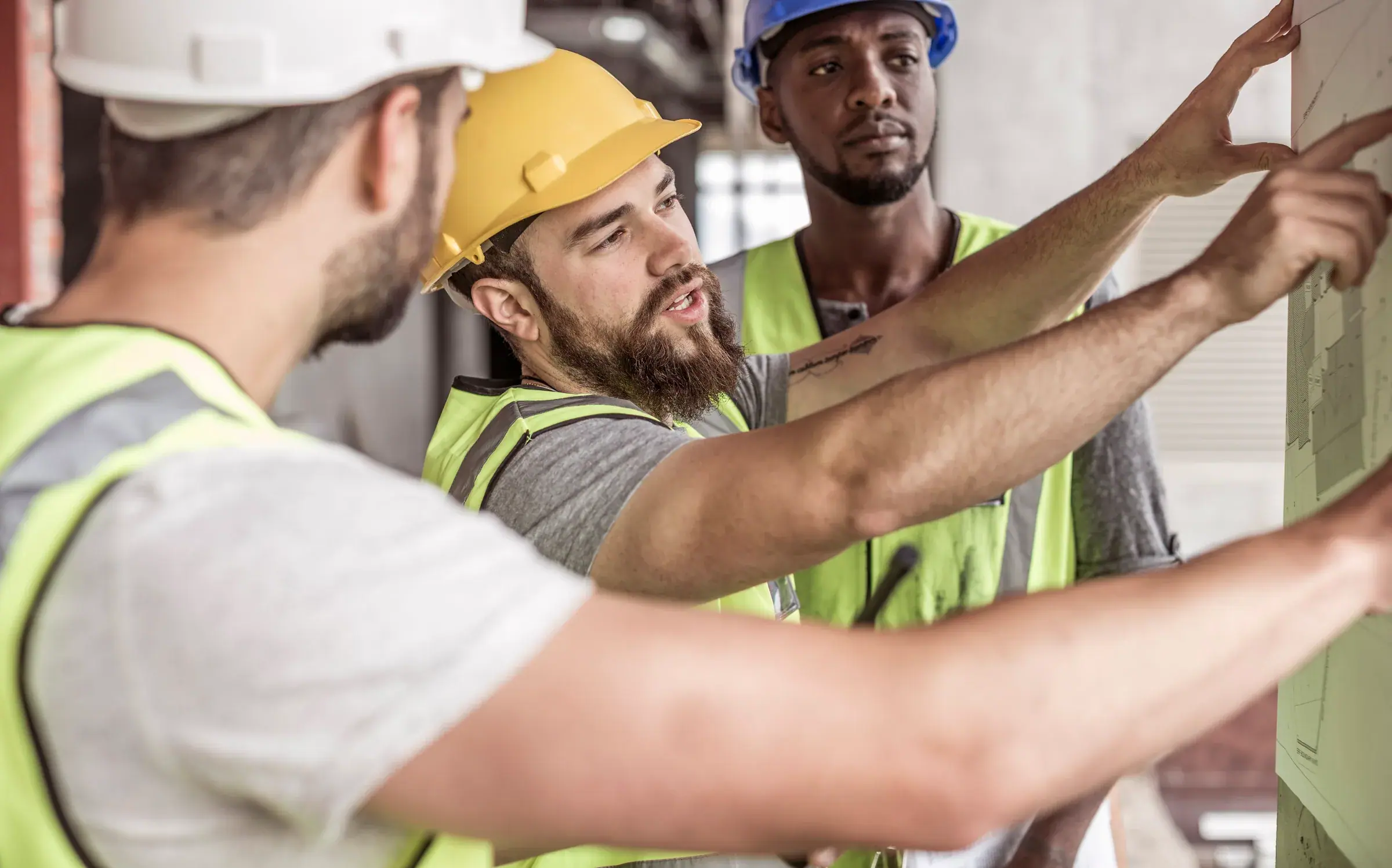 Lordes Development team members reviewing work on site